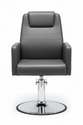 PRIVÉ Stationary Customer Chair front view showing wide seat, leatherette upholstery, and weighted non-swivel chrome pedestal base on white background