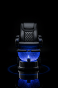MYSTIQUE pedicure chair with crystal-embellished AURORA bowl illuminated in deep blue against black background, chrome base reflecting glow