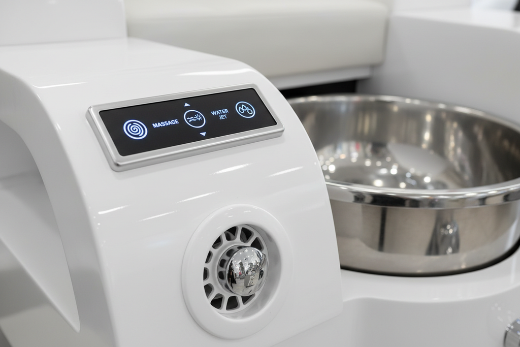 Close-up of INFINITY DCS digital control panel buttons and ECOJET impeller access port inside the basin